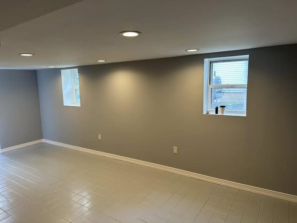 Finished basement with recessed lighting